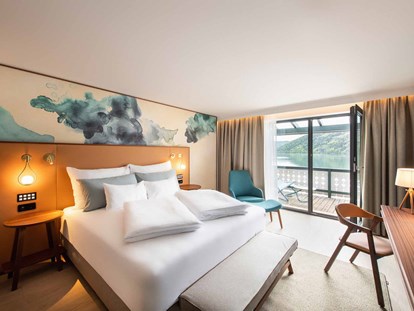 Luxusurlaub - Umgebungsschwerpunkt: Berg - Österreich - Moderne Zimmer & Suiten - Seeglück Hotel Forelle