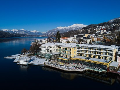 Luxusurlaub - Saunalandschaft: finnische Sauna - Patergassen - Hotelansicht im Winter - Seeglück Hotel Forelle