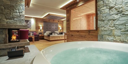 Luxusurlaub - Saunalandschaft: Außensauna - Alpbach - Luxus-Suiten mit eigener Sauna und Whirlpool - Verwöhnhotel Kristall