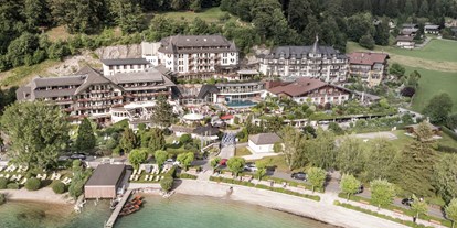 Luxusurlaub - Saunalandschaft: Außensauna - Salzburg - Aussenansicht Sommer - Ebner's Waldhof am See