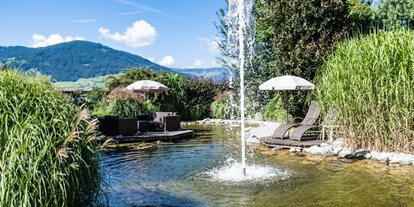 Luxusurlaub - Saunalandschaft: Außensauna - Tiroler Unterland - Wellnessgarten - Landhotel Schermer