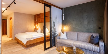 Luxusurlaub - Saunalandschaft: Dampfbad - Gerlos - Komfort Suite "Fichtenwald" - Landhotel Schermer