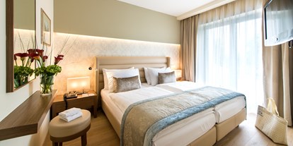 Luxusurlaub - Saunalandschaft: finnische Sauna - Region Villach - Doppelzimmer Deluxe - Hotel Warmbaderhof*****
