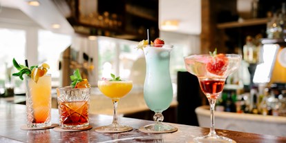 Luxusurlaub - Wellnessbereich - Gasteinertal - Genießen Sie unsere Cocktailvariationen an unserer Hotelbar - CESTA GRAND  Aktivhotel & Spa