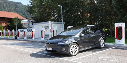 Luxusurlaub - Ladestation Elektroauto - Pongau - 18 Tesla-Supercharger vor der Haustür! - Schlosshotel Lacknerhof****S Flachau