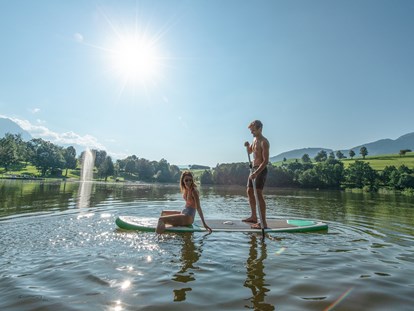 Luxusurlaub - Wellnessbereich - Kössen - Stand-up paddeln am Ritzensee - Ritzenhof****S - Hotel & Spa am See