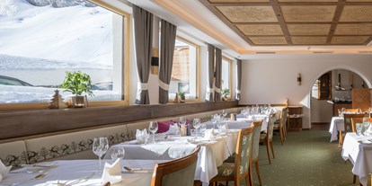 Luxusurlaub - Hotel-Schwerpunkt: Luxus & Wellness - Davos Dorf - Hotel Albona Nova Zürs am Arlberg 
Restaurant mit Ausblick  - Hotel Albona Nova