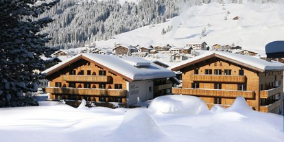 Luxusurlaub - Saunalandschaft: Infrarotkabine - Serfaus - Fassade Winter - Hotel Gotthard