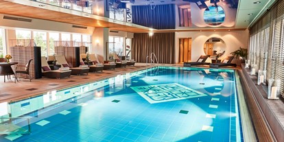 Luxusurlaub - Saunalandschaft: finnische Sauna - Tegernsee - Kempinski The Spa - Hotel Vier Jahreszeiten Kempinski München