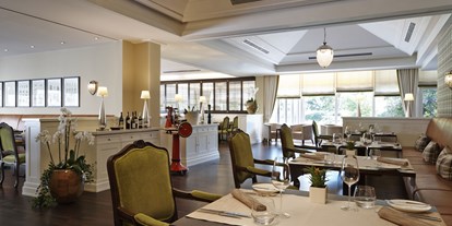 Luxusurlaub - Bar: Hotelbar - Neu-Isenburg - Restaurant EssTisch - Kempinski Hotel Frankfurt Gravenbruch 