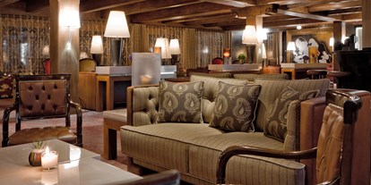 Luxusurlaub - Verpflegung: Halbpension - Schweiz - Bar und Lobby  - Tschuggen Grand Hotel