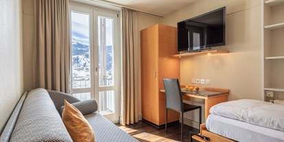 Luxusurlaub - Sauna - Separates Schlafzimmer im Familienzimmer Eiger, Hotel Belvedere Grindelwald - Belvedere Swiss Quality Hotel Grindelwald