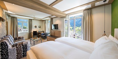 Luxusurlaub - Saunalandschaft: finnische Sauna - Deluxe Doppelzimmer, Hotel Belvedere Grindelwald - Belvedere Swiss Quality Hotel Grindelwald
