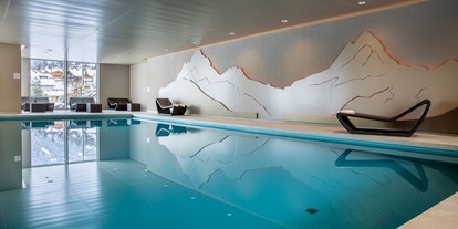 Luxusurlaub - Saunalandschaft: Dampfbad - Wellness im Hotel Belvedere Grindelwald: Schwimmbad, 6x14m - Belvedere Swiss Quality Hotel Grindelwald
