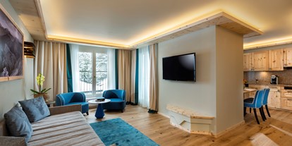 Luxusurlaub - Saunalandschaft: finnische Sauna - Zimmer - Precise Tale Seehof Davos