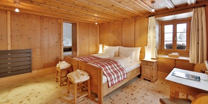 Luxusurlaub - Hotel-Schwerpunkt: Luxus & Kulinarik - Davos Dorf - Engadiner Familien-Zimmer - In Lain Hotel Cadonau