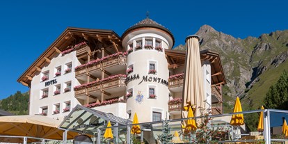 Luxusurlaub - Saunalandschaft: Dampfbad - Hirschegg (Mittelberg) - Aussenbild Sommer - Relais & Châteaux Chasa Montana