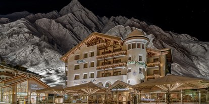 Luxusurlaub - Parkplatz: kostenlos beim Hotel - Nauders - Aussenbild Winter - Relais & Châteaux Chasa Montana