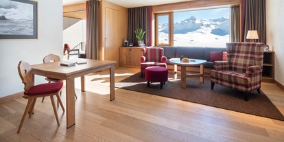 Luxusurlaub - Hotel-Schwerpunkt: Luxus & Wellness - Melchsee-Frutt - Suite Wohnbereich, Winter - Frutt Mountain Resort