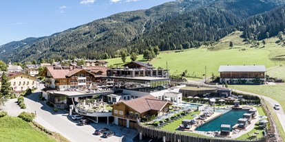 Luxusurlaub - Saunalandschaft: finnische Sauna - Bad Ischl - Alpin Life Resort Lürzerhof