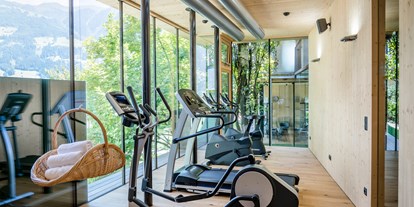 Luxusurlaub - Saunalandschaft: finnische Sauna - Tux - Fitnessraum - Gardenhotel Crystal