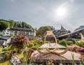 Luxushotel: Außenansicht Sommer - Ebner's Waldhof am See