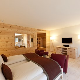 Luxushotel: Terrassen Junior-Suite - In Lain Hotel Cadonau