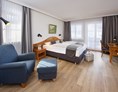 Luxushotel: Doppelzimmer Comfort, mit Balkon, ca. 30 m², Dusche, WC, Flat-TV mit Radio, WLAN gratis. - Concordia Wellnesshotel & Spa 