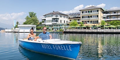 Luxusurlaub - Saunalandschaft: finnische Sauna - Bootstour am Millstätter See - Seeglück Hotel Forelle