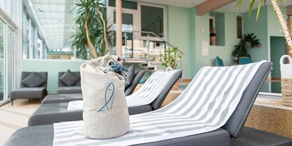 Luxusurlaub - Saunalandschaft: finnische Sauna - Entspannung im Wellnessbereich - Seeglück Hotel Forelle