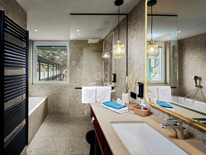 Luxusurlaub - Umgebungsschwerpunkt: See - Modernes Badezimmer - Seeglück Hotel Forelle