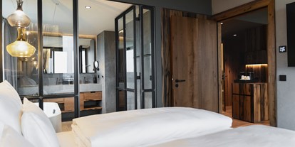 Luxusurlaub - Saunalandschaft: finnische Sauna - Great Bustard Zimmer - Scheiblhofer The Resort