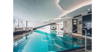 Luxusurlaub - Hotel-Schwerpunkt: Luxus & Kultur - Mittelberg (Mittelberg) - Infinity Pool mit Pistenblick - Elizabeth Arthotel