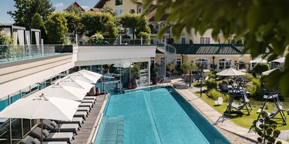 Luxusurlaub - Saunalandschaft: finnische Sauna - 25 m Infinity-Pool im Gartenbereich - 5-Sterne Wellness- & Sporthotel Jagdhof