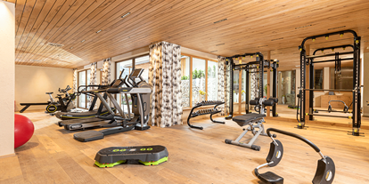 Luxusurlaub - Saunalandschaft: finnische Sauna - Fit and healthy - großzügiger, heller Fitnessraum mit top Geräten der Firma Technogym - Alpbacherhof****s - Mountain & Spa Resort