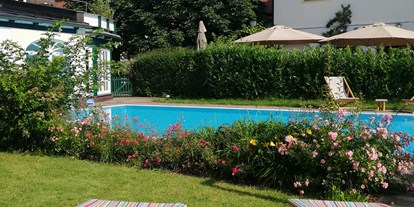 Luxusurlaub - Pools: Infinity Pool - Schönau am Königssee - Aussenpool - Romantik Spa Hotel Elixhauser Wirt