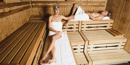 Luxusurlaub - Saunalandschaft: Infrarotkabine - Leogang Hütten - Sauna - Landhotel Schermer