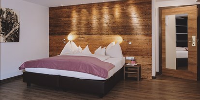 Luxusurlaub - Saunalandschaft: finnische Sauna - Zimmer - Hotel DIE SONNE ****S