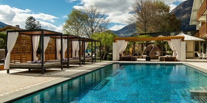 Luxusurlaub - Parkplatz: kostenlos beim Hotel - Trentino-Südtirol - Außenpool - Hotel Paradies Family & Spa