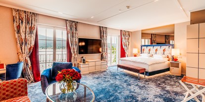 Luxusurlaub - Bettgrößen: Queen Size Bett - Feld am See - Junior Suite mit Seeblick - Hotel Schloss Seefels