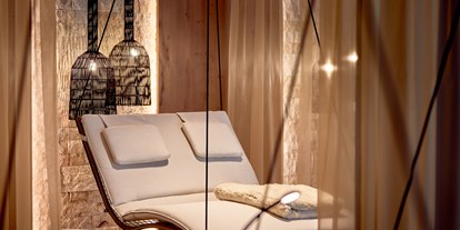 Luxusurlaub - Saunalandschaft: finnische Sauna - Ruheraum - DAS EDELWEISS Salzburg Mountain Resort