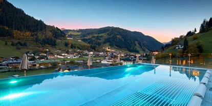 Luxusurlaub - Restaurant: Gourmetrestaurant - Infinity Pool - DAS EDELWEISS Salzburg Mountain Resort