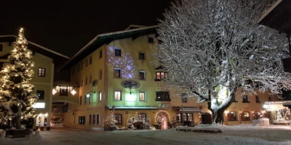 Luxusurlaub - Wellnessbereich - Mühlau (Innsbruck) - Außenansicht Winter
Eingang Restaurant - Hotel „Der Kirchenwirt****s"