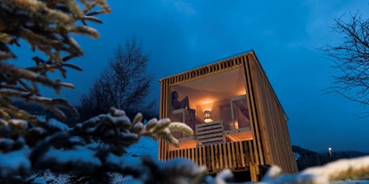 Luxusurlaub - Schweiz - Sauna im Hotelgarten - In Lain Hotel Cadonau