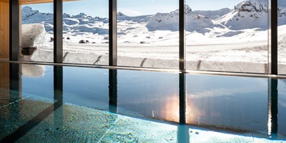 Luxusurlaub - Saunalandschaft: finnische Sauna - Eigergletscher - Spa Innenpool, Winter - Frutt Mountain Resort