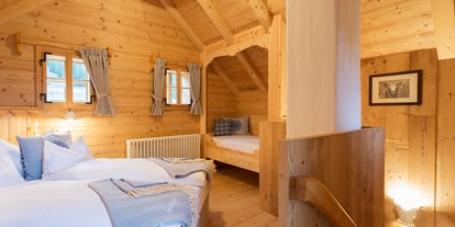 Luxusurlaub - Hotel-Schwerpunkt: Luxus & Natur - Kärnten - Troadkasten Schlafzimmer - Almdorf Seinerzeit 