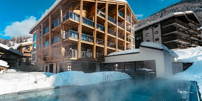 Luxusurlaub - Umgebungsschwerpunkt: Berg - Saas-Almagell - Residenz Altiana mit Infinitypool für Familien.  - Resort La Ginabelle