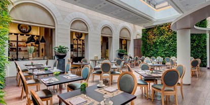 Luxusurlaub - Bar: Hotelbar - Restaurant "Wintergarten" - Palais Hansen Kempinski Vienna