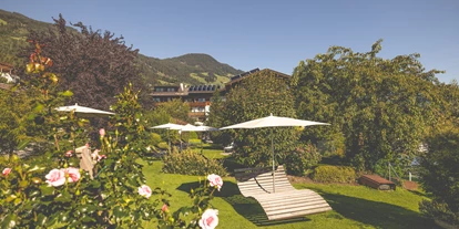 Luxusurlaub - Bettgrößen: Doppelbett - Mühlau (Innsbruck) - Blumenliegewiese im Garten - Gardenhotel Crystal