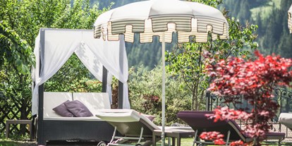 Luxusurlaub - Saunalandschaft: finnische Sauna - Garten  - Alpin Garden Luxury Maison & Spa